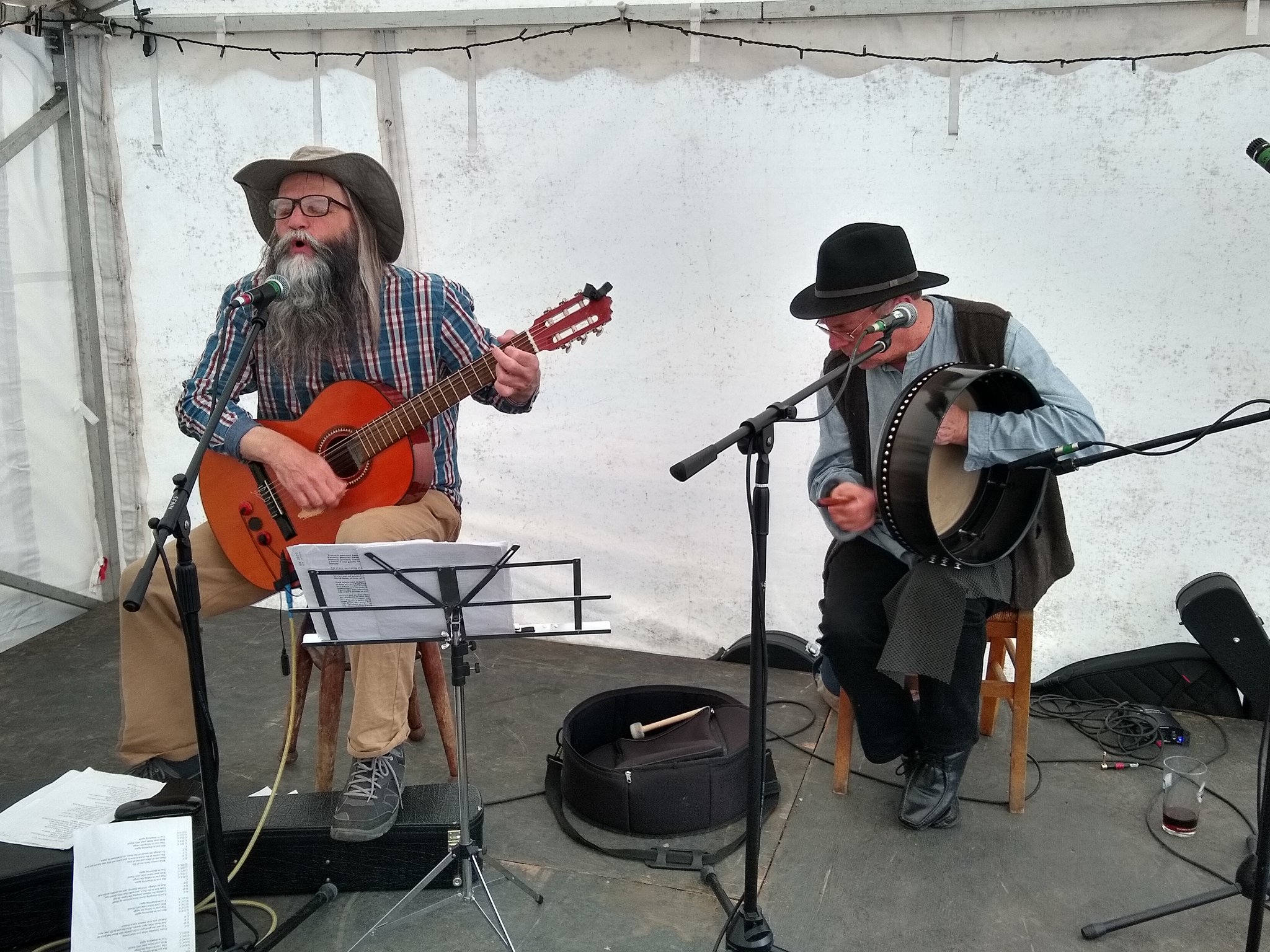 Alan.s.Robinson playing guitar and singing with Paul Pearson on Bodhran